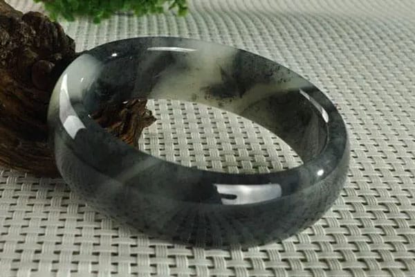 墨玉内部有裂纹吗_墨玉上有毛絮状白线吗
