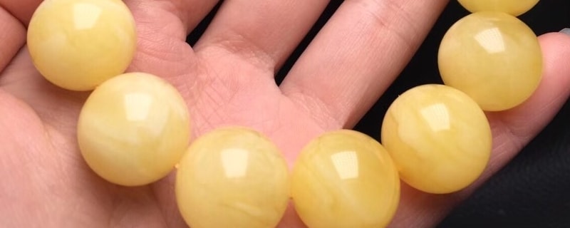 白花蜜蜡和鸡油黄哪个好