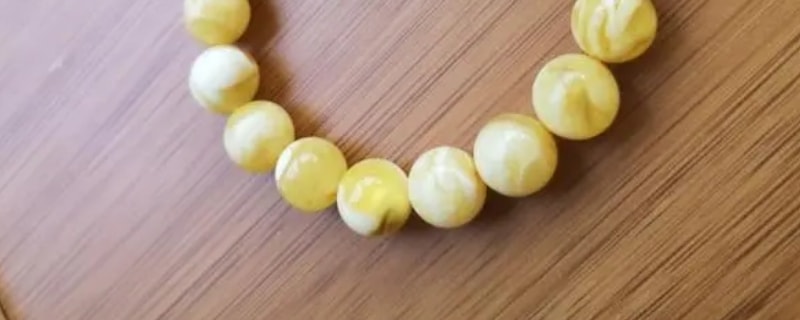 蜜蜡带白花的好还是不带白花的好